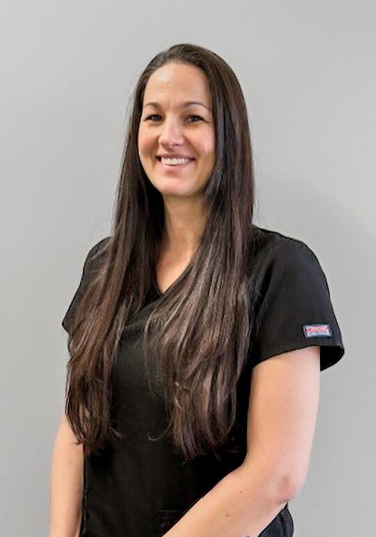 Sami - Ortho Assistant Orthodontic Assistant Sami smiling in a black uniform against a neutral background, representing the Klein Walker & Weber Orthodontics team in Overland Park and Olathe.